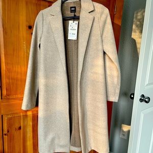 Zara long coat never been worn. New with tag.Light beige.